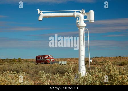 Water standpipe and Old Ghan Train, Farina Railway Station, Farina Ghost Town, outback South Australia, Australia Stock Photo