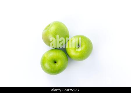 Group of three Green apples isolated on white background, fresh green apples for organic fruits Stock Photo