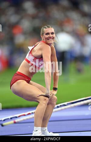 Alysha Newman, of Canada, competes in the women's pole vault final at