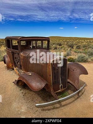 A 1932 Studebaker may be the most photographer abandoned car in the US.  It was intentionally placed in the park to make the abandoned historic Route Stock Photo