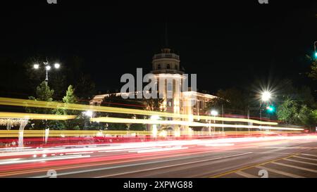 Yellow and red night traffic light trails in long exposure Stock Photo