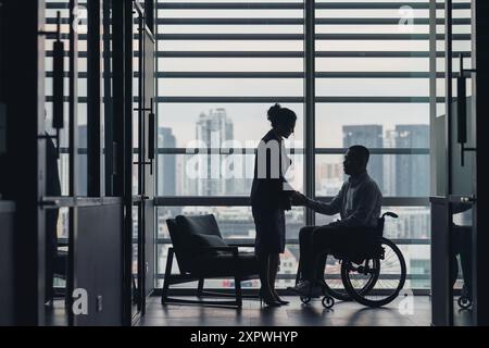 Diverse Asian business executives discussing Stock Photo