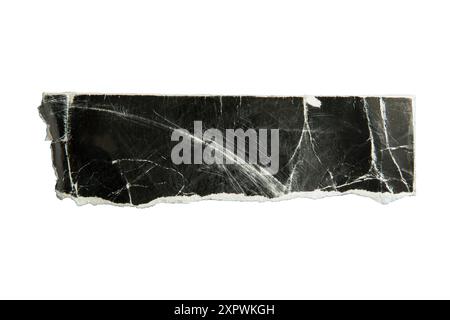 Torn distressed black paper banner on white background with clipping path Stock Photo