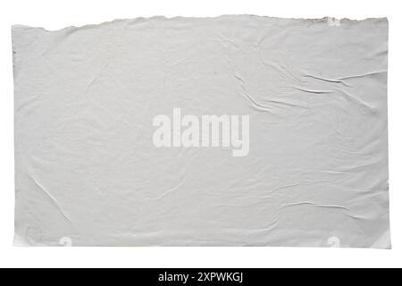 Torn A4 paper glued on a wall on white background with clipping path Stock Photo