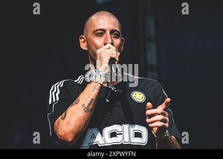 Example, the British rapper and singer, performs at Camp Bestival in ...