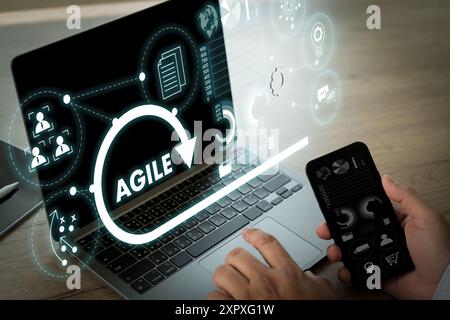 agile software development Business developer using computer Stock Photo