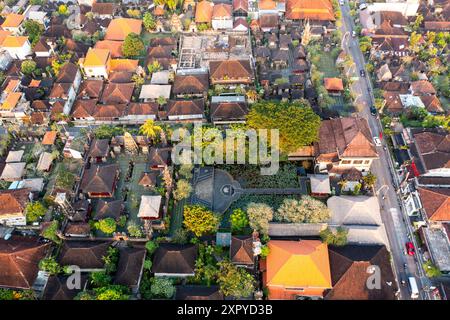 Ubud, Bali: Aerial drone view of the Ubud town center with historic Hindu Balinese temples and Palaces in Bali, Indonesia. Stock Photo
