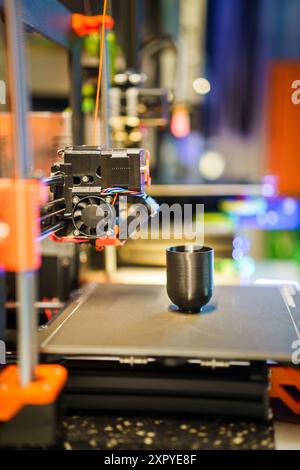 3D object printed by 3d printer farm in a home factory. Production and handicraft. New technologies. Stock Photo