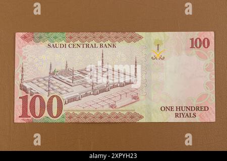 Saudi Arabia one hundred riyals banknote reverse side features the Prophet's Mosque, Al Madinah Al Monawarah (Masjid Nabawi). Stock Photo