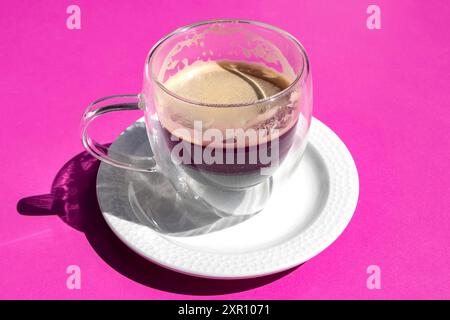 black coffee in french cafe still life France on pink background Stock Photo