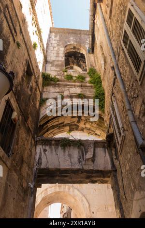 Smaller gate at the reverse of the Iron Gate, on Ispod Ure, Split 21000, Croatia. Seen from Narodni trg. Forms part of Western Gate seen beyond. (138) Stock Photo