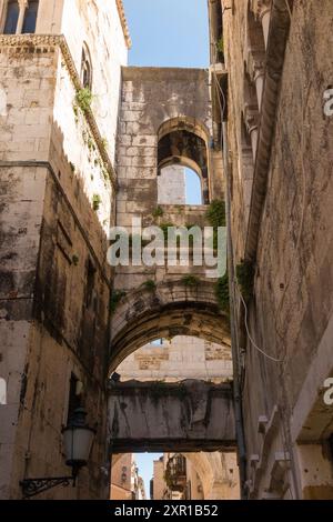 Smaller gate at the reverse of the Iron Gate, on Ispod Ure, Split 21000, Croatia. Seen from Narodni trg. Forms part of Western Gate seen beyond. (138) Stock Photo