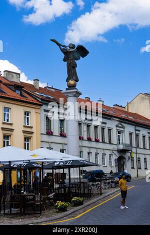 Vilnius, Lithuania. June 28, 2024. Angel of Uzupis, a statue of an angel blowing a trumpet in the main square Stock Photo