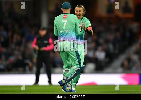 London, England. 8th Aug 2024. Tom Curran celebrates taking the wicket of Kieron Pollard with Sam Billings during The Hundred fixture between Oval Invincibles Men and Southern Brave Men at The Kia Oval, London. Kyle Andrews/Alamy Live News. Stock Photo