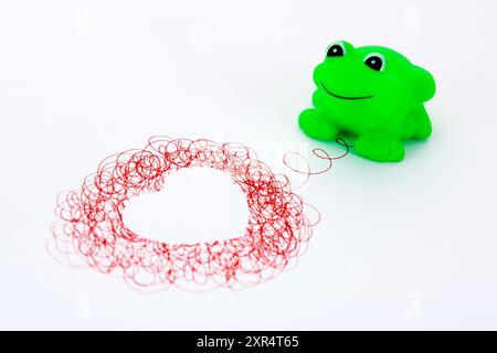 Frog attached to heart drawn with lines Stock Photo