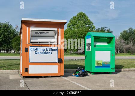 Clothing shoe donation pods bins charity reuse donate giving. Stock Photo