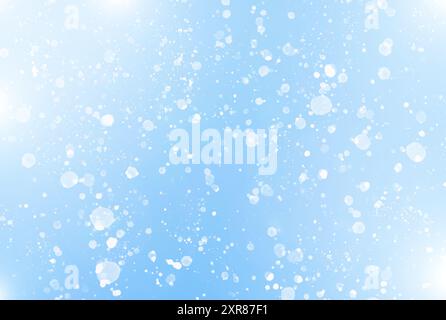 Abstract white bokeh lights scattered across a blue winter background, creating a festive, dreamy atmosphere. Template for holiday-themed designs or c Stock Photo
