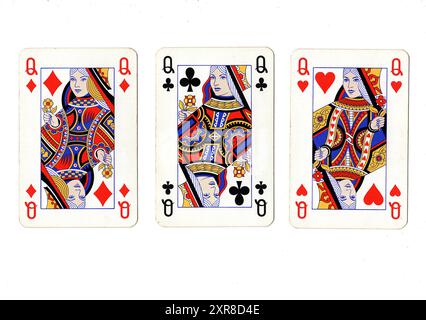 Vintage playing cards showing three queens on a white background. Stock Photo