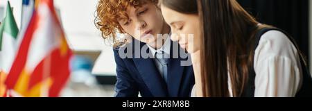 Two teenagers engaged in a UN Model simulation. Stock Photo