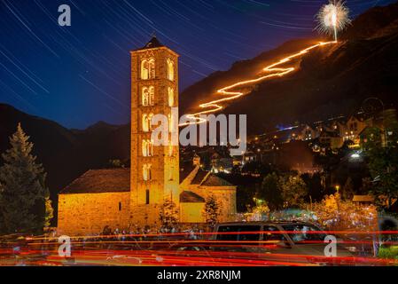 Taüll Falles (torchlight) descent, behind the Romanesque church of Sant Climent de Taüll, in the Boí Valley (Alta Ribagorça, Lleida, Catalonia, Spain) Stock Photo