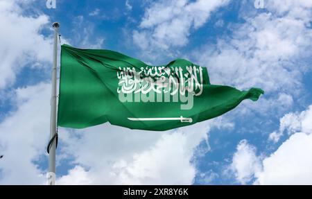 Saudi Arabia flag - realistic waving fabric flag. Stock Photo