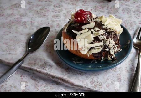 very delicious donuts on a plate with isolated background Stock Photo