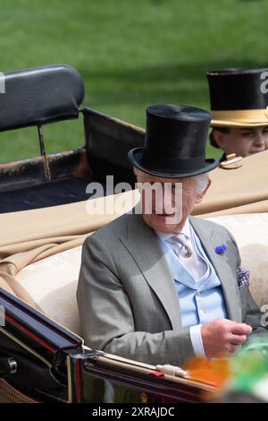 Ascot, UK. 20th June, 2024. King Charles III arrives in the Royal Procession in the Parade Ring at Royal Ascot on Ladies Day. Credit: Maureen McLean/Alamy Stock Photo