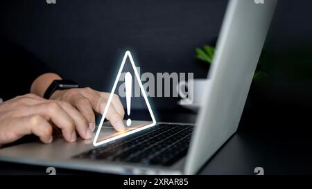 Businessman using computer laptop with triangle caution warning sing , Http 404 error not found page template concept. Triangle caution warning sing o Stock Photo