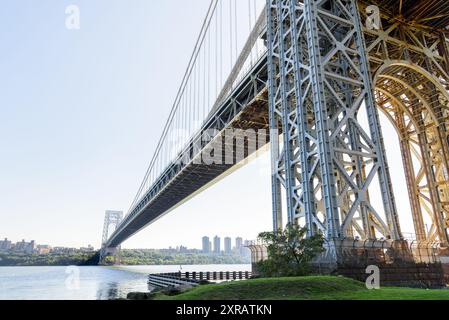 Low angle view of George Washington bridge spanning Hudson river on a clear autumn morning Stock Photo