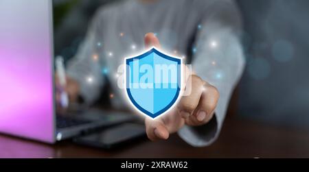 Cyber security and network protection concept, Businessman holding shield protect icon. cybersecurity concept Global network security technology, busi Stock Photo