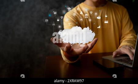 Hands of businessman using smartphone, tablet with cloud computing, computer system resources and storage, cloud service technology concept. Hand touc Stock Photo