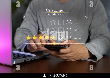 User give rating to service experience on online application, Customer review satisfaction feedback survey concept, Customer can evaluate quality of s Stock Photo