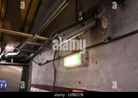 A CCTV security camera in a disused tunnel at Holborn Tube Station Stock Photo