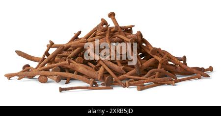 pile of rusty old warped nails isolated white background, corroded and unusable brownish steel construction fastening material result of rust, bent Stock Photo