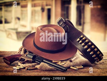 Western accessories on wooden table Stock Photo