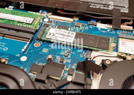 Iserlohn, NRW, Germany. 09th of 2024. Installed NVME memory module inserted into laptop. Computer Internals Stock Photo
