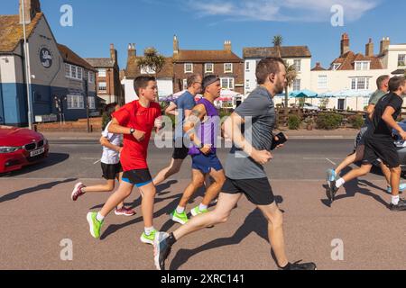 England, Kent, Deal, Group of Charity Runners Stock Photo