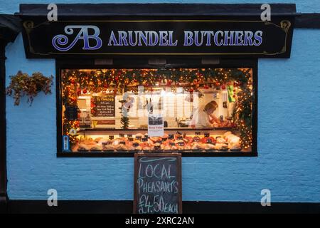 England, Sussex, West Sussex, Arundel, Traditional Butchers Shop Window Display Stock Photo