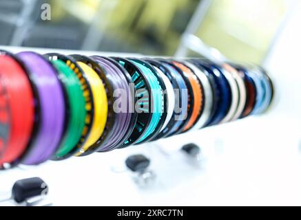 Coils with bright multi-colored wire, close-up, blurry Stock Photo