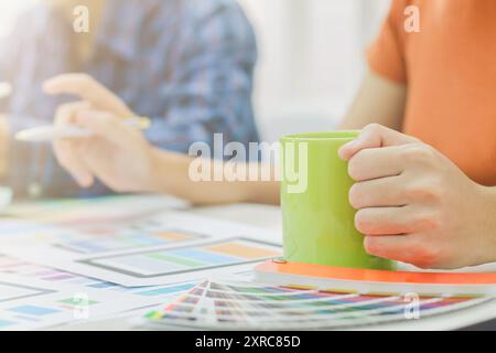 Smooth Focus, group of web designers are working together to develop mobile responsive website with UI UX Front End Designer Previewing. website desig Stock Photo