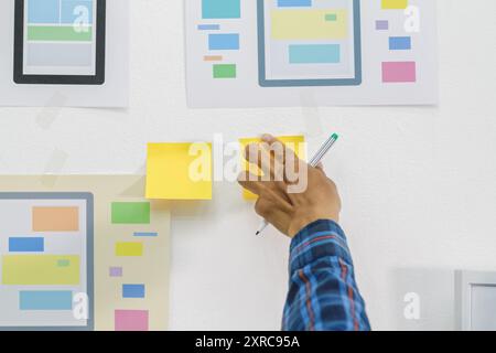 Smooth Focus, group of web designers are working together to develop mobile responsive website with UI UX Front End Designer Previewing. website desig Stock Photo