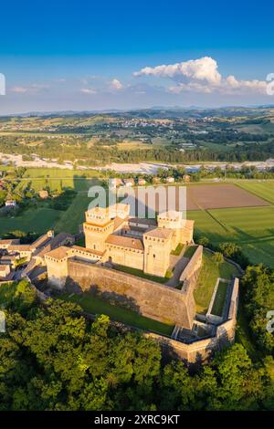 Aerial view of castle of Torrechiara during a summer sunset, Langhirano, Parma province, Emilia Romagna, Italy, Europe, Stock Photo