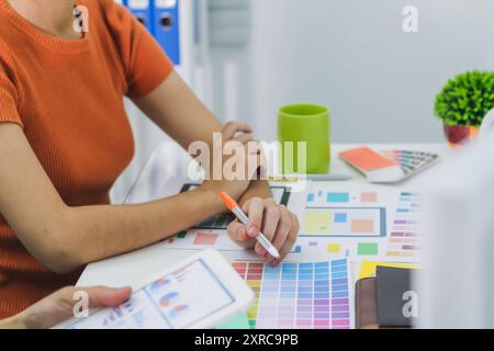 Smooth Focus, group of web designers are working together to develop mobile responsive website with UI UX Front End Designer Previewing. website desig Stock Photo