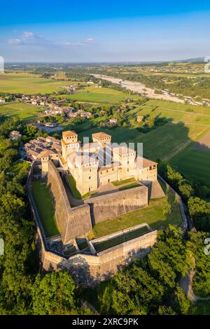 Aerial view of castle of Torrechiara during a summer sunset, Langhirano, Parma province, Emilia Romagna, Italy, Europe, Stock Photo