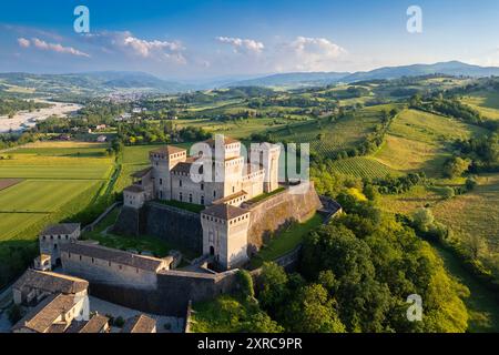 Aerial view of castle of Torrechiara during a summer sunset, Langhirano, Parma province, Emilia Romagna, Italy, Europe, Stock Photo