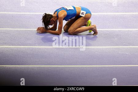 Paris, France. 9th Aug, 2024. Nadia Battocletti of Italy reacts after the women's 10000m final of Athletics at the Paris 2024 Olympic Games in Paris, France, Aug. 9, 2024. Credit: Li Ying/Xinhua/Alamy Live News Stock Photo