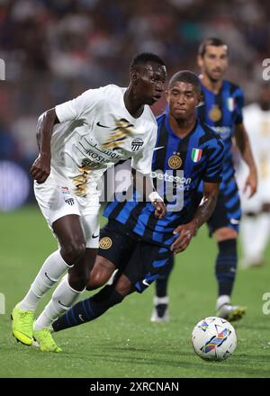 Monza, Italy. 7th Aug, 2024. Marwan Al-Sahafi of Al-Ittihad is pursued by Eddie Salcedo of FC Internazionale during the Pre Season Friendly match at U-Power Stadium, Monza. Picture credit should read: Jonathan Moscrop/Sportimage Credit: Sportimage Ltd/Alamy Live News Stock Photo