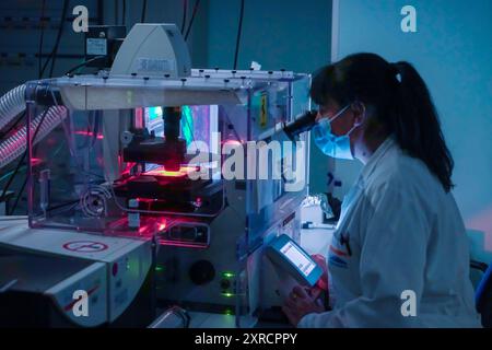 Turin, Italy - October 19 2021: young researchers at work in a cancer laboratory dedicated to scientific research Stock Photo