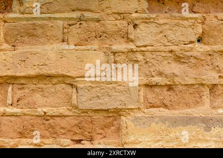 Seamless ancient brick wall texture or background. Old red brick wall dated by the end of 18th century Stock Photo