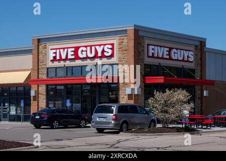 Roseville, Minnesota.  American fast food chain Five Guys is focused on hamburgers, hot dogs, and french fries. Stock Photo